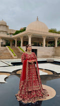 KANZARA Zarina bridal lehenga in deep red with antique gold embroidery, full sleeve kurta and matching dupatta