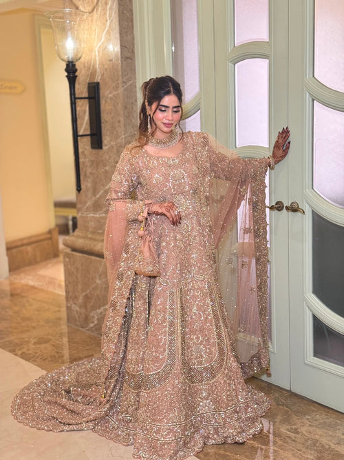 KANZARA Rukhsar rose gold bridal lehenga with pearl and sequin work and long train