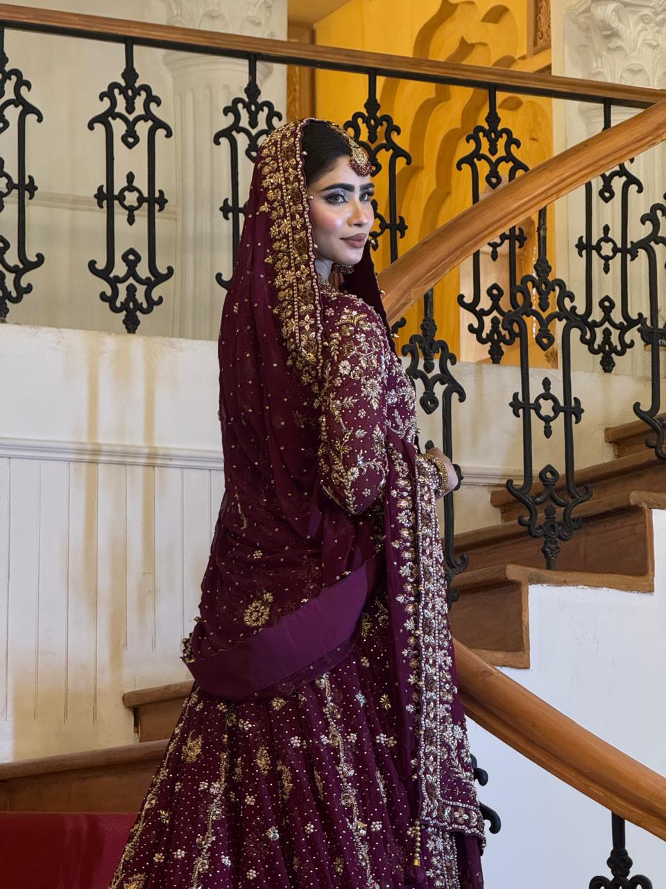 Close view of the KANZARA Shehnaz plum bridal lehenga bodice and embroidered dupatta border