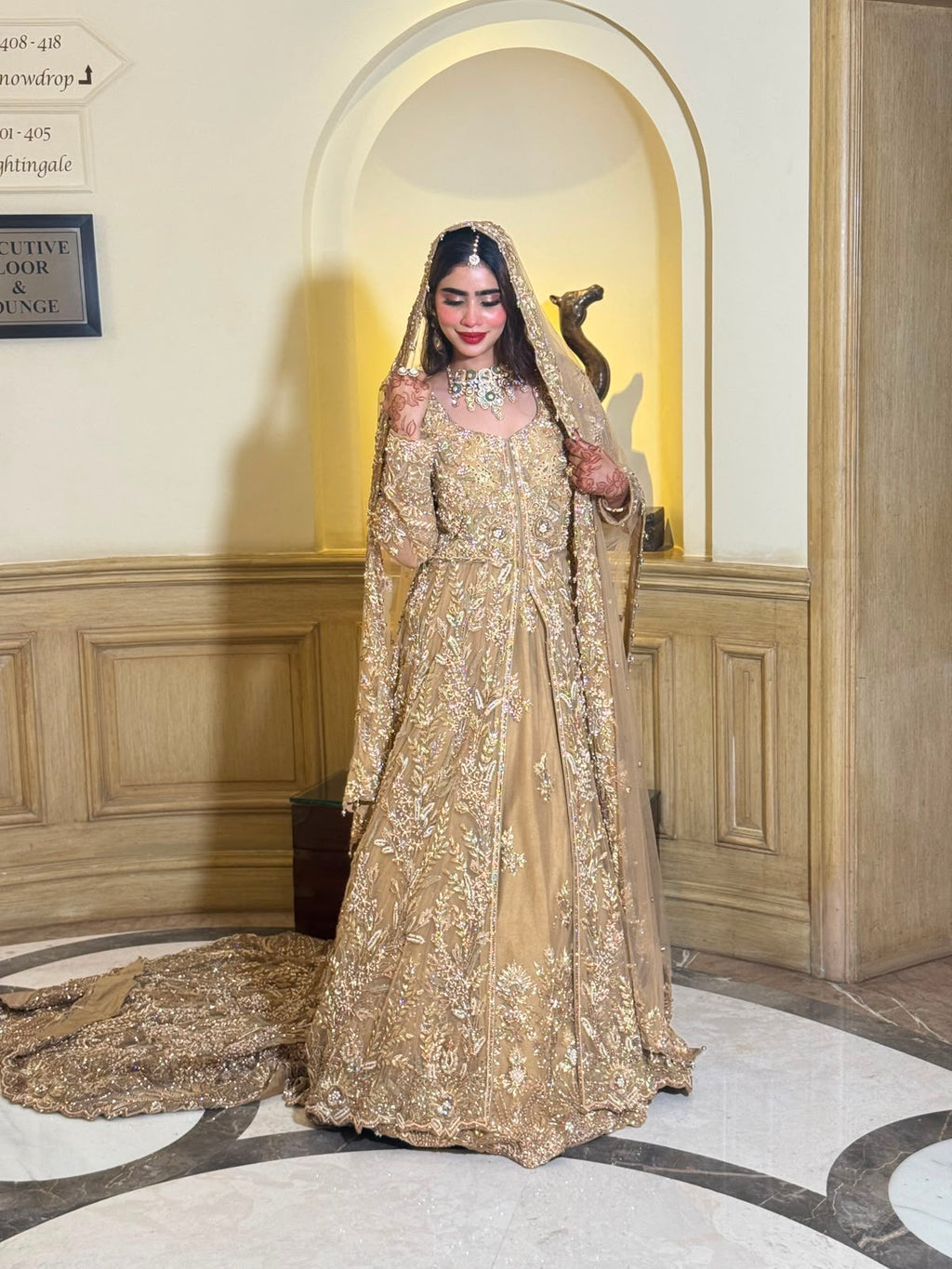 KANZARA Sehrish champagne gold bridal gown with pearl and crystal hand work