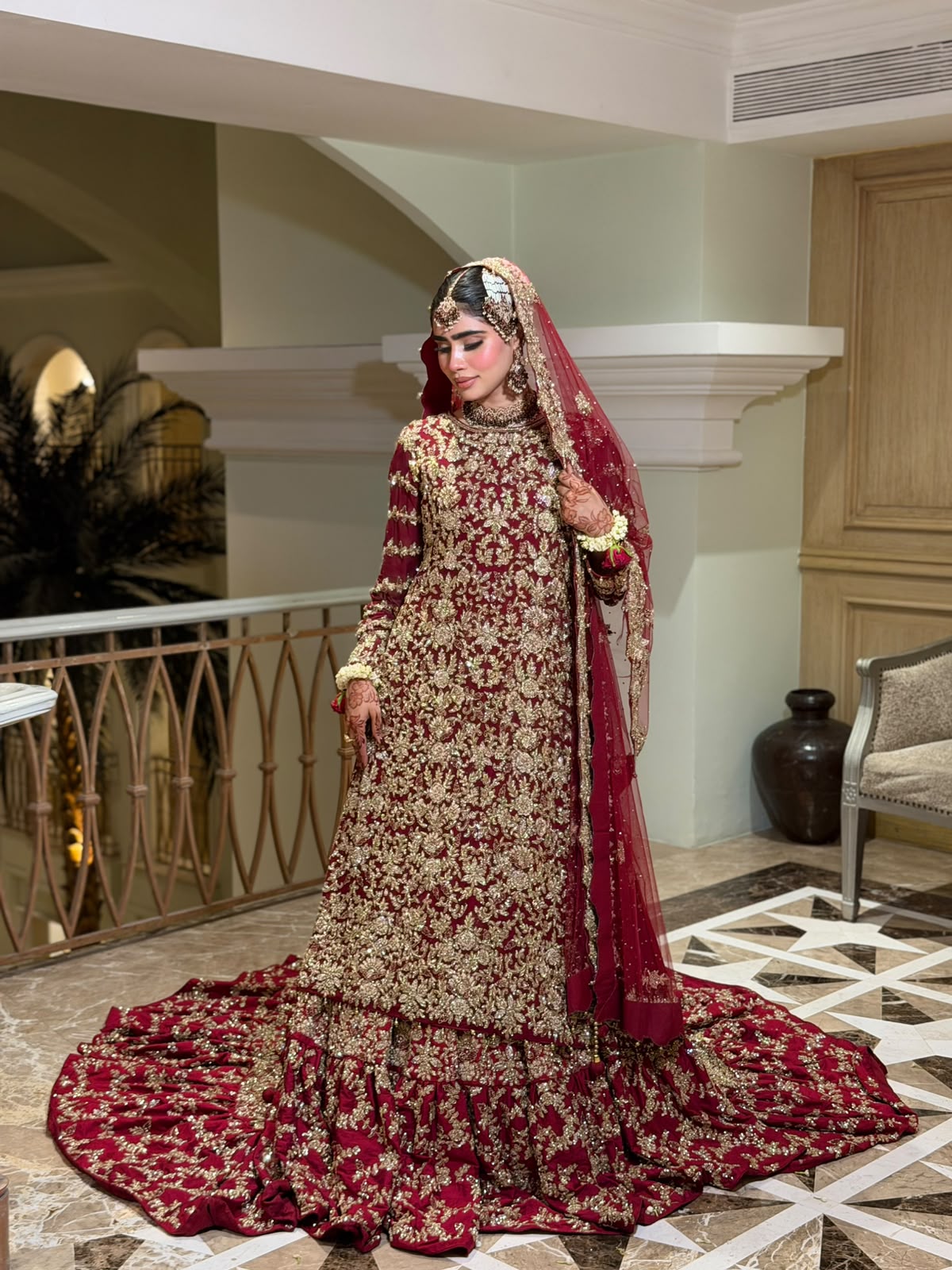 KANZARA Gulnaar wine red bridal gown with heavy gold sequin work and cathedral train
