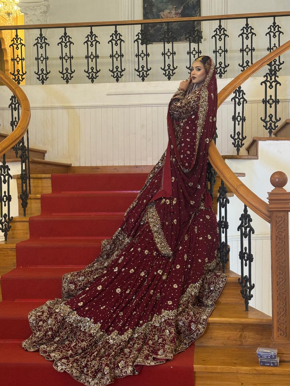 KANZARA Shehnaz plum bridal lehenga with gold and silver motifs and tiered embroidered hem