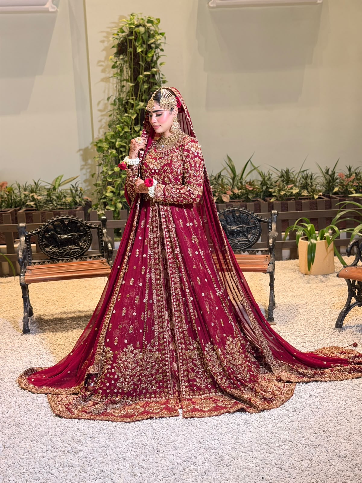 KANZARA Mehrunisa crimson bridal gown with gold zardozi, front-open panels and long trailing dupatta